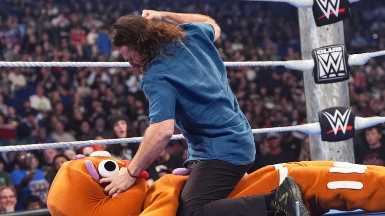 Sami Zayn attacks the Gingerbread Man on 