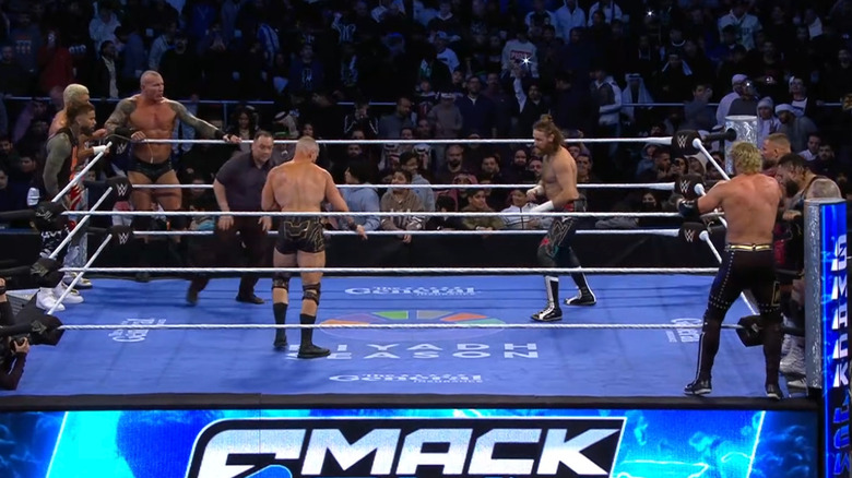 All eight men in the ring