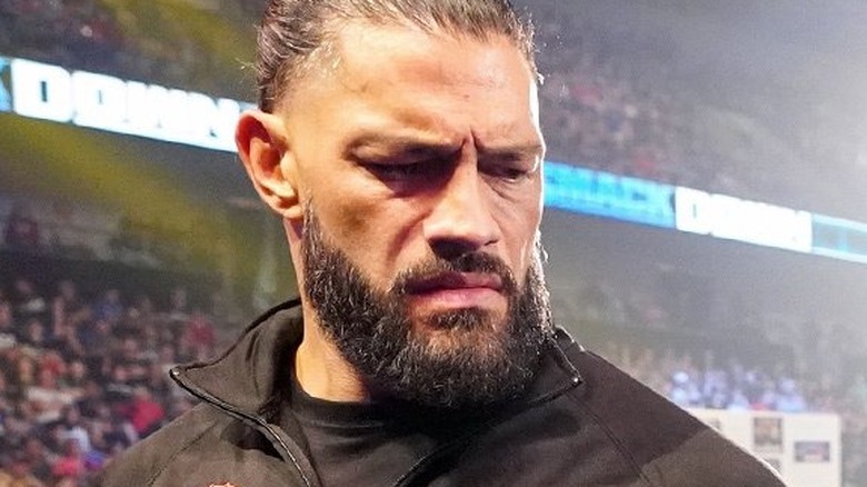 Roman Reigns looking to the side