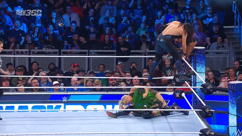 Rodriguez looking for a suplex off the top on Li