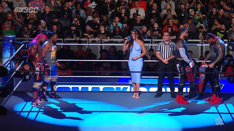 The four men facing off in the ring