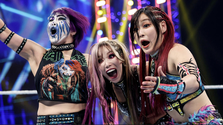 Asuka, Sane, and SKY in the ring