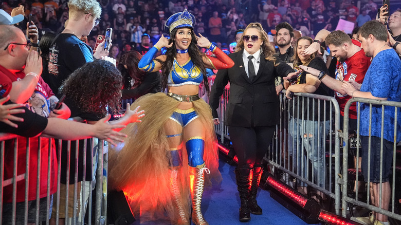 Chelsea Flair coming to the ring with Slaygent P