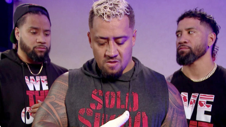 Sikoa and The Usos backstage