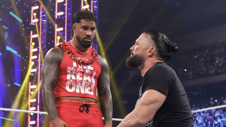Jey Uso staring at Roman Reigns