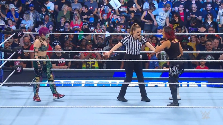 Asuka and Bayley in the ring