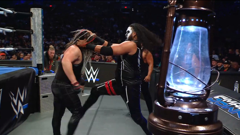 Howdy and Talla brawling on the outside of the ring