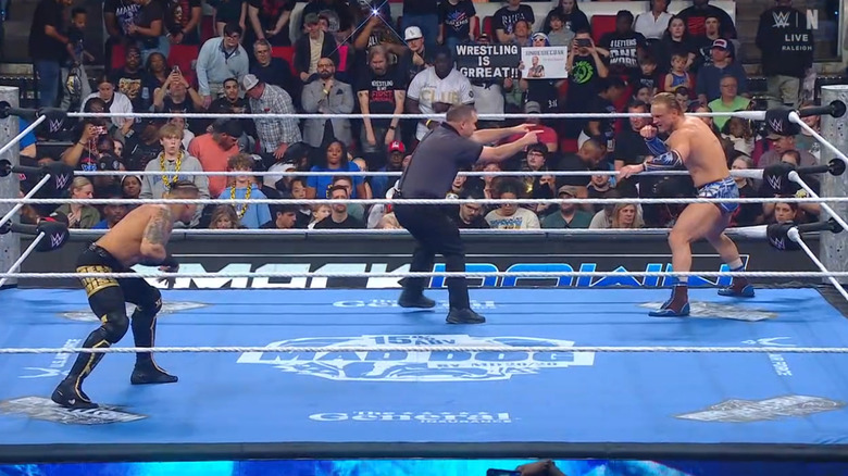 Hayes and Dragunov staring one another down before the bell