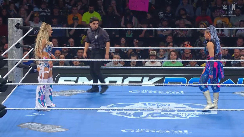 Stratton and Giulia staring one another down in the ring