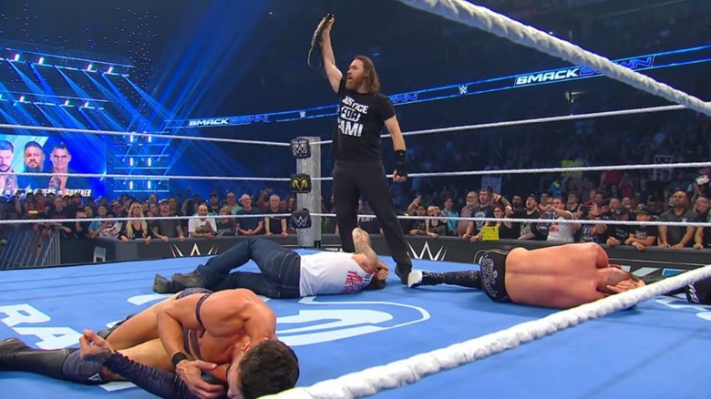 Sami Zayn stands tall over CM Punk, Finn Balor, and Gunther