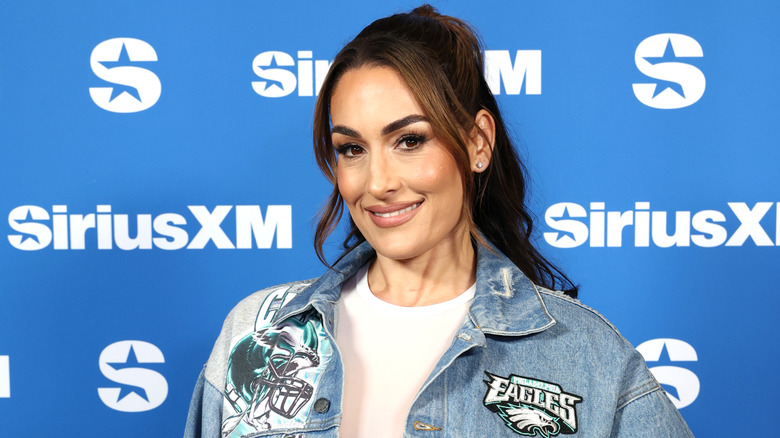 Nikki posing at a SiriusXM event