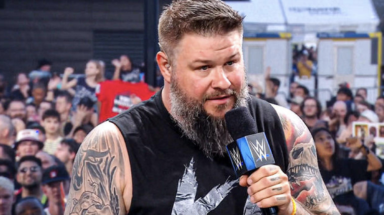 Owens speaking on a panel
