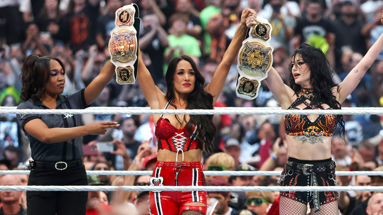 Brie Bella and Paige celebrate their tag title win at WrestleMania 42