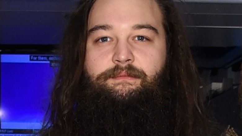 Bray Wyatt standing for a photo