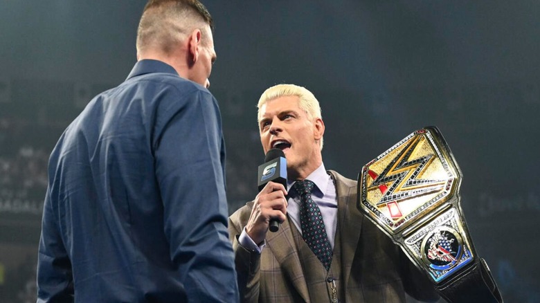 Undisputed WWE Champion Cody Rhodes holds up the championship while cutting a promo on GUNTHER in the ring during the May 29 edition of 