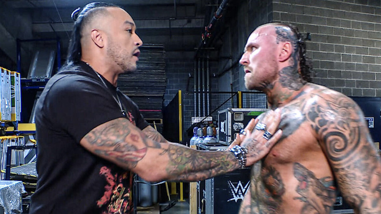 Priest and Black during a backstage confrontation