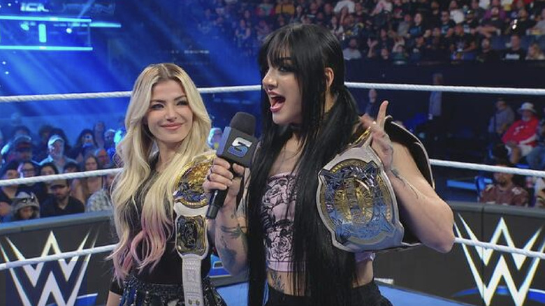 Bliss and Paxley inside the ring as they speak