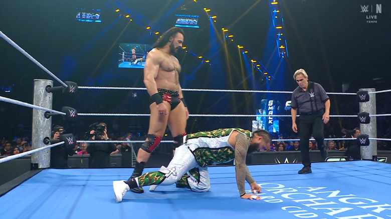 McIntyre standing over Jimmy