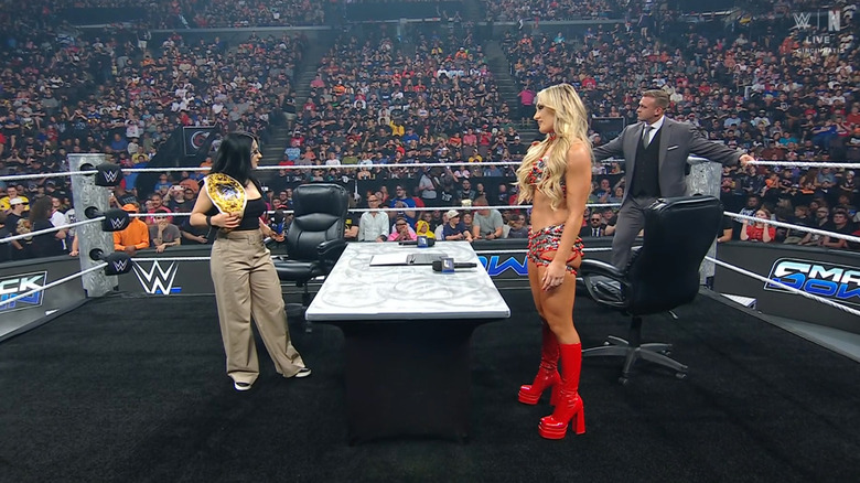 Vaquer and Stratton standing at the desk