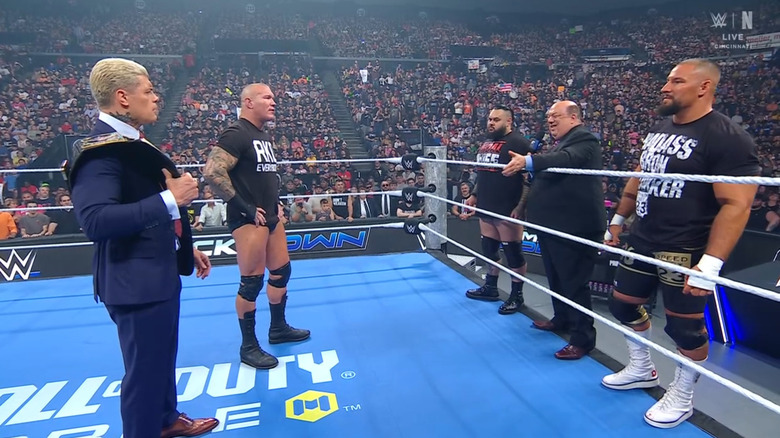 Rhodes, Orton, and The Vision in the ring