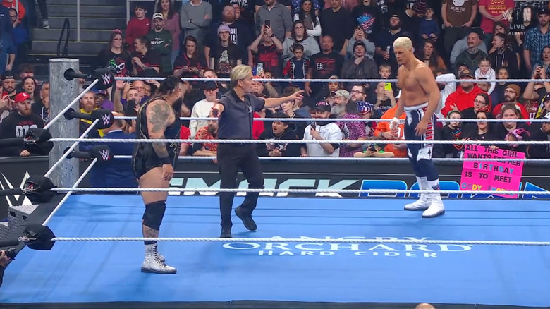 Reed and Rhodes staring one another down