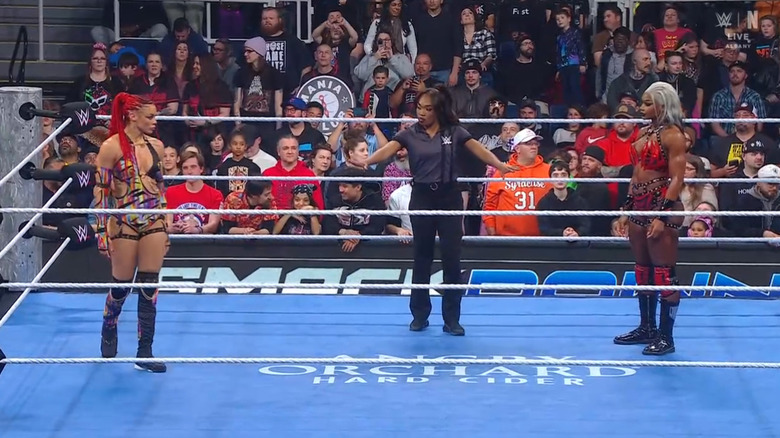 B-Fab and Jade Cargill staring one another down