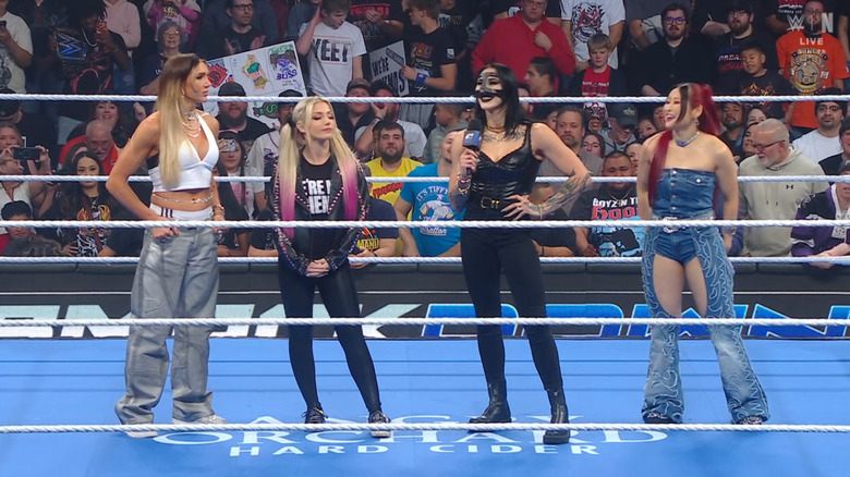 Flair, Bliss, Ripley, and SKY inside the ring