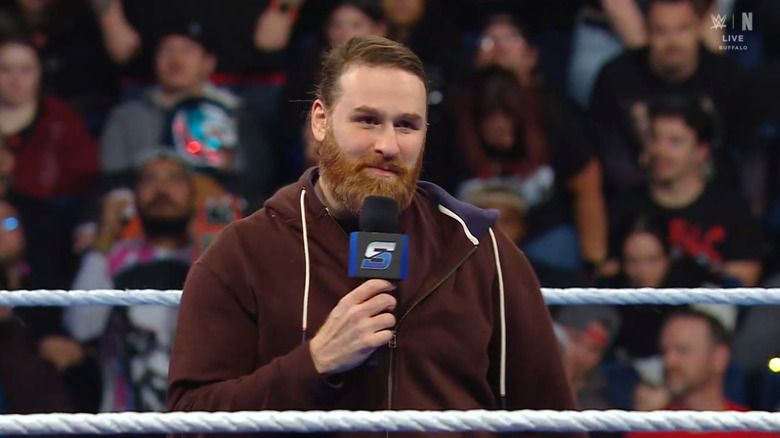 Zayn talking in the ring