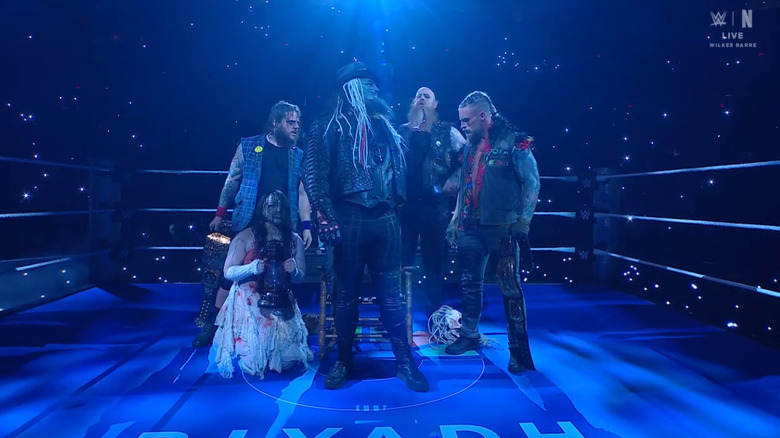 The Wyatt Sicks standing in the ring