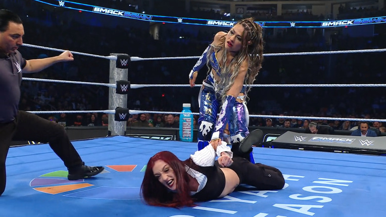 Giulia wearing down Fyre in the ring