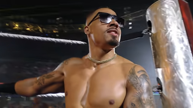 Carmelo Hayes looks on as he makes his entrance.