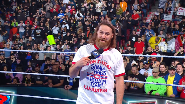 Zayn in the ring talking