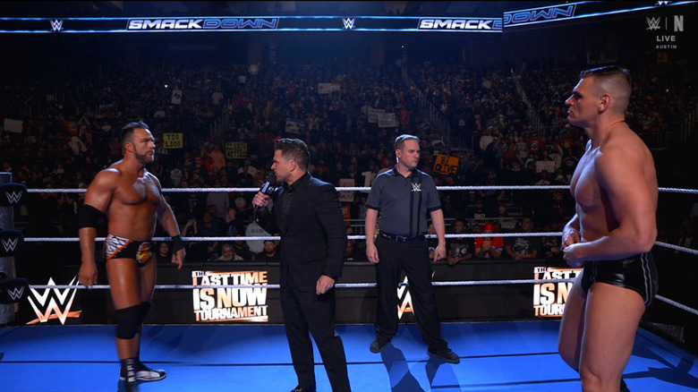 Knight and GUNTHER in the ring during the ring announcement