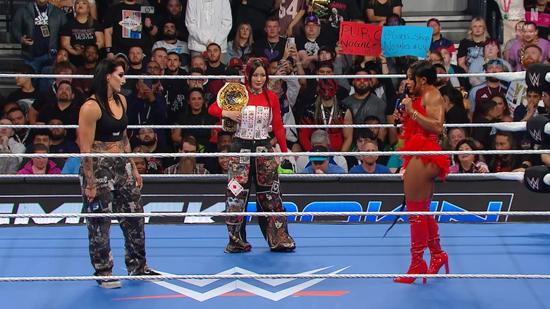 Ripley, SKY, and Belair in the ring