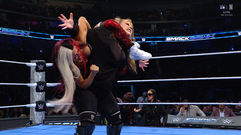 Vega wearing down Niven with a submission hold