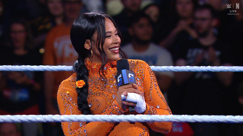 Belair smiling in the ring