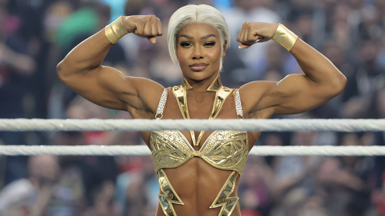 Cargill flexing her biceps in the ring