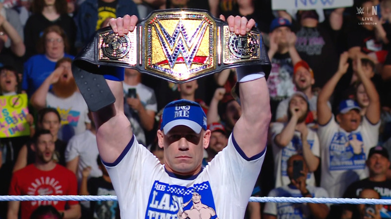 Cena holding up his Undisputed WWE Championship