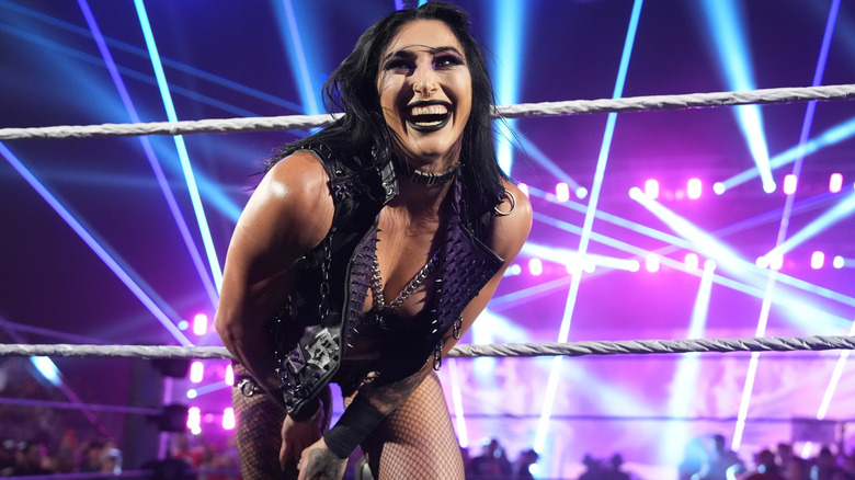 Ripley smiling on the outside of the ring