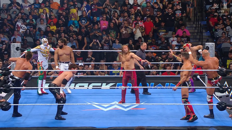 The eight men in the ring