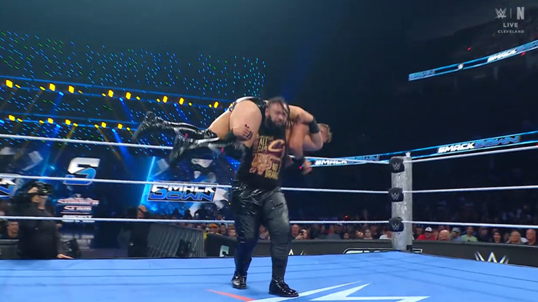 Fatu with Miz on his shoulders