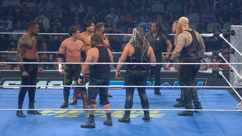 All eight men in the ring