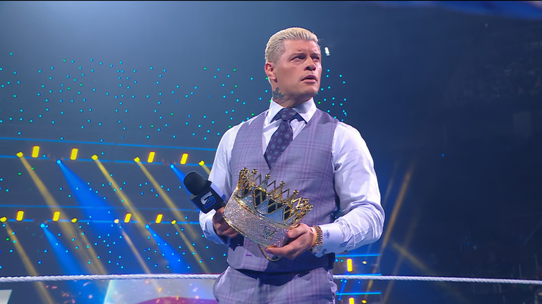 Rhodes holding his King Of The Ring crown