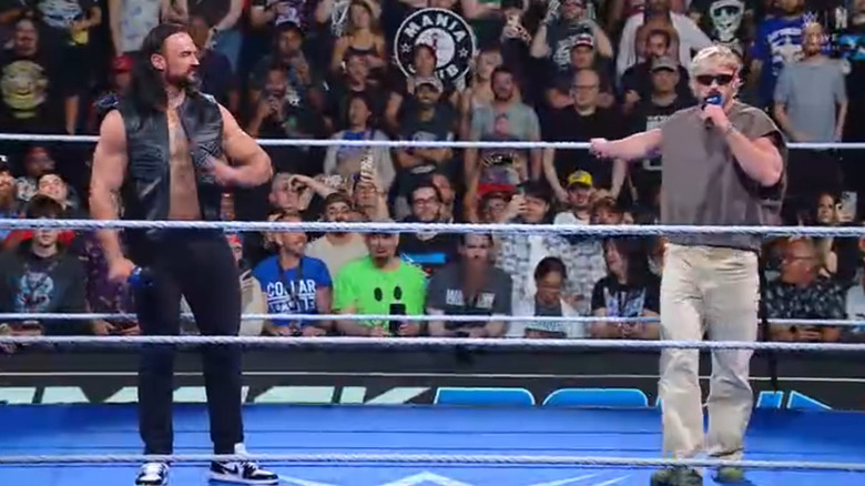 McIntyre and Paul in the ring talking
