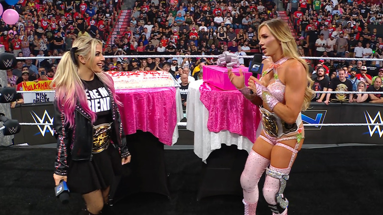 Flair presenting Bliss with her presents