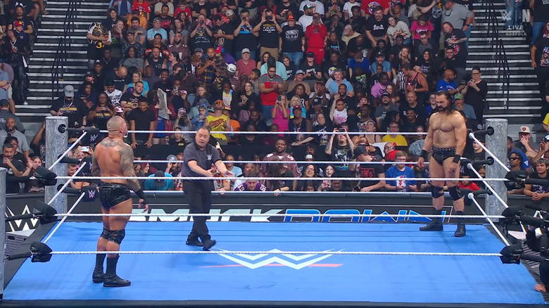 Orton and McIntyre staring one another down in the ring
