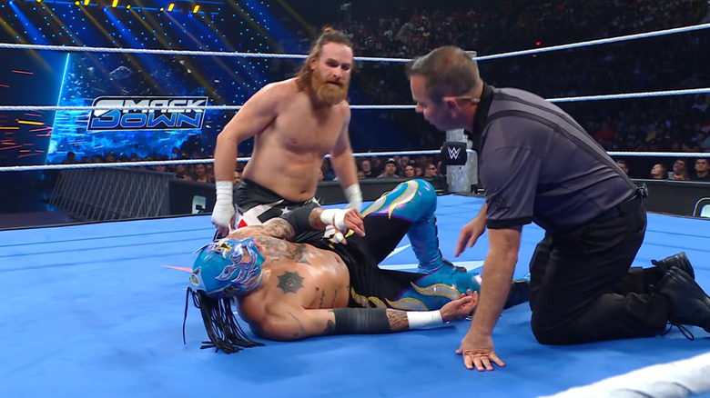 Zayn and Fenix in the ring