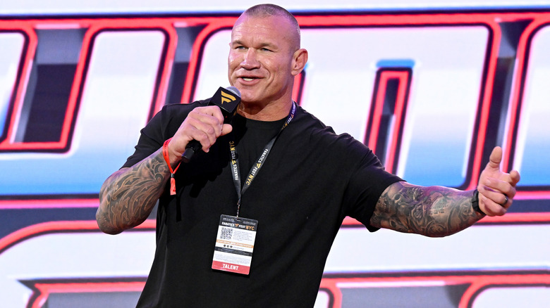 Orton talking at a SummerSlamm Fanatics Fest event