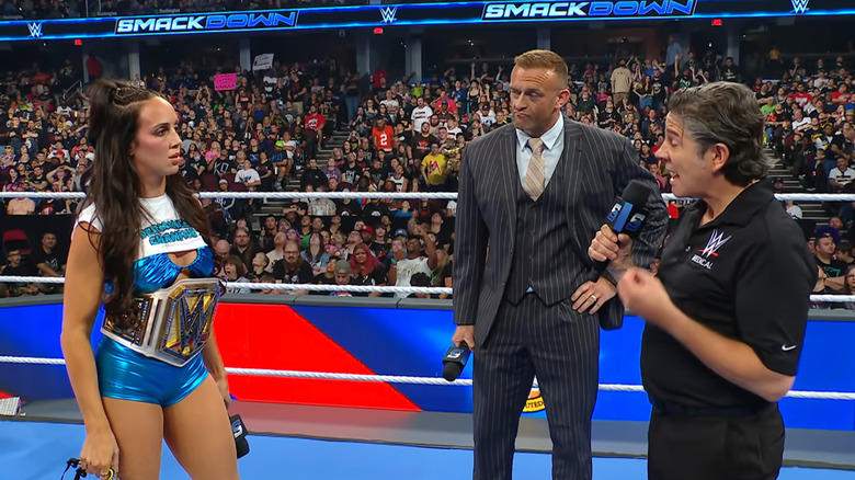 Green, Aldis, and the doctor inside the ring