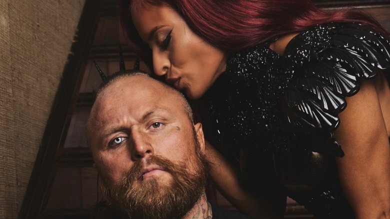 Zelina Vega kisses the head of husband Aleister Black in a photo posted to her X account.